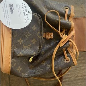 authentic LOUIS VUITTON Monogram Mini Montsouris Backpack